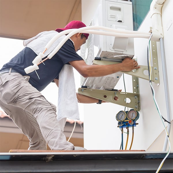 los beneficios de la instalación de aire acondicionado en un edificio de oficinas incluyen un ambiente más cómodo y productivo para los empleados